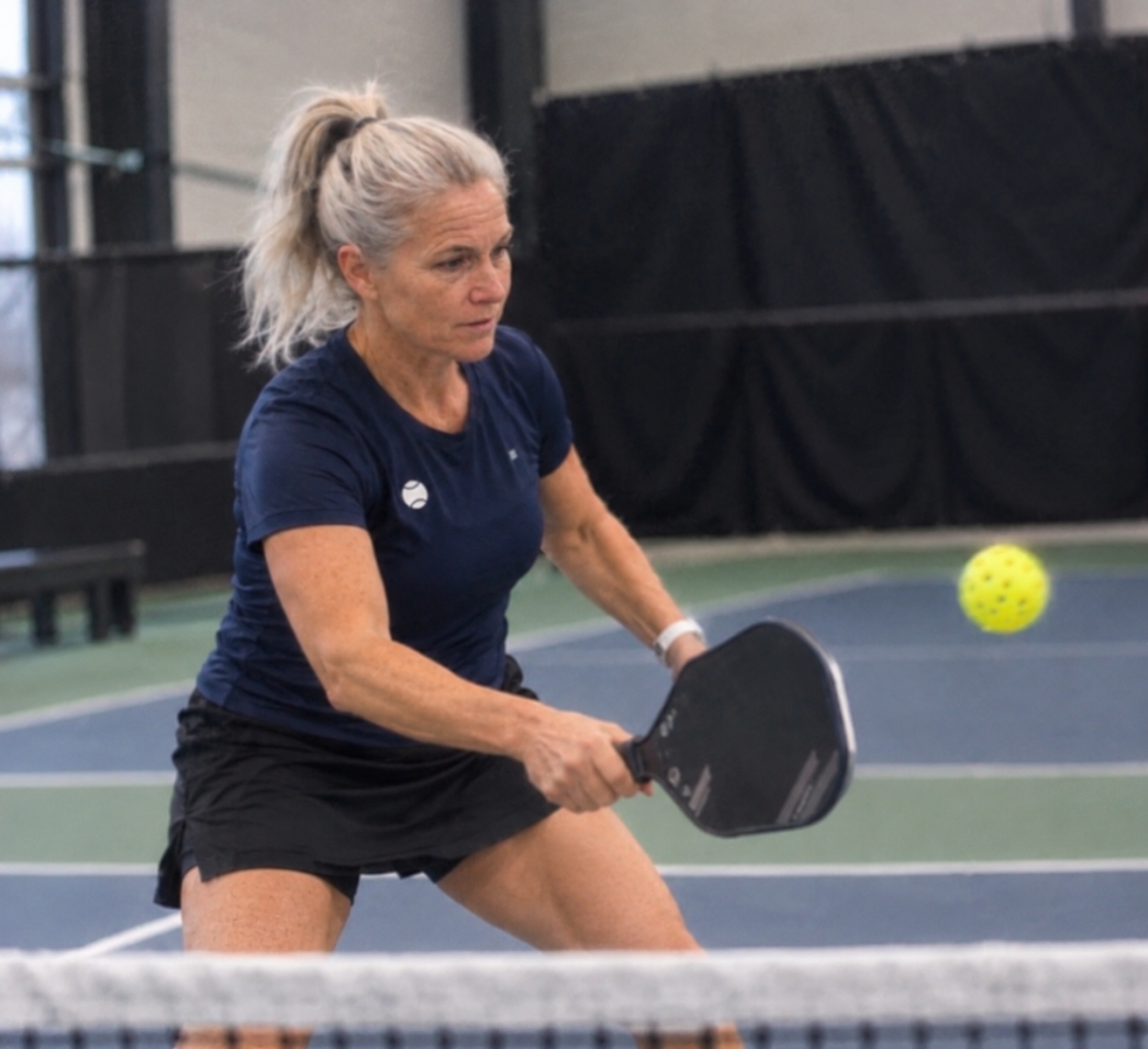 Coach Claire playing pickleball